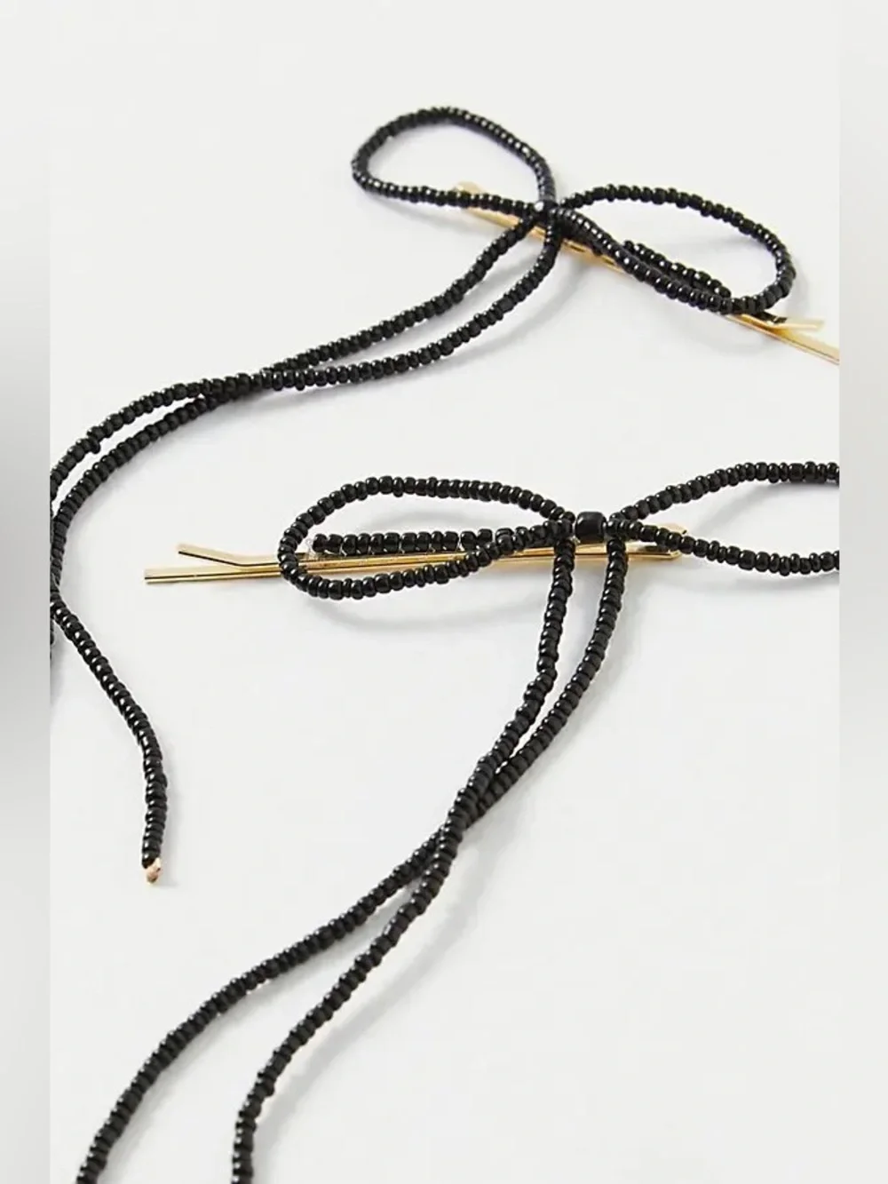 Free People beaded bow pin
